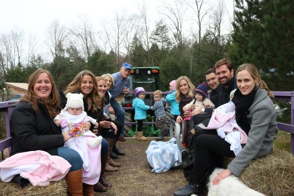 families on a hayride at buttonwood grove