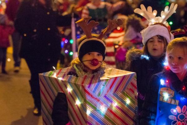 children in costume for parade of lights