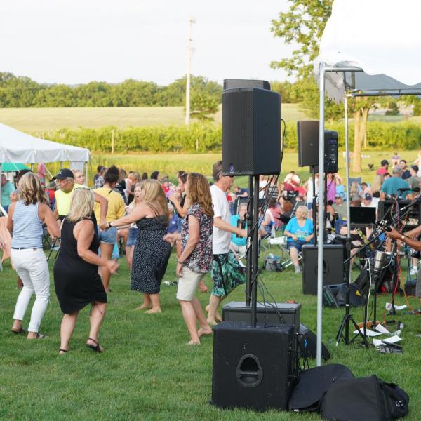 customers dancing at a concert at Deer Run Winery